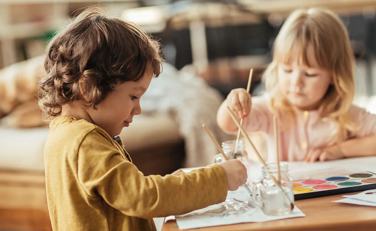 Kids painting using watercolor